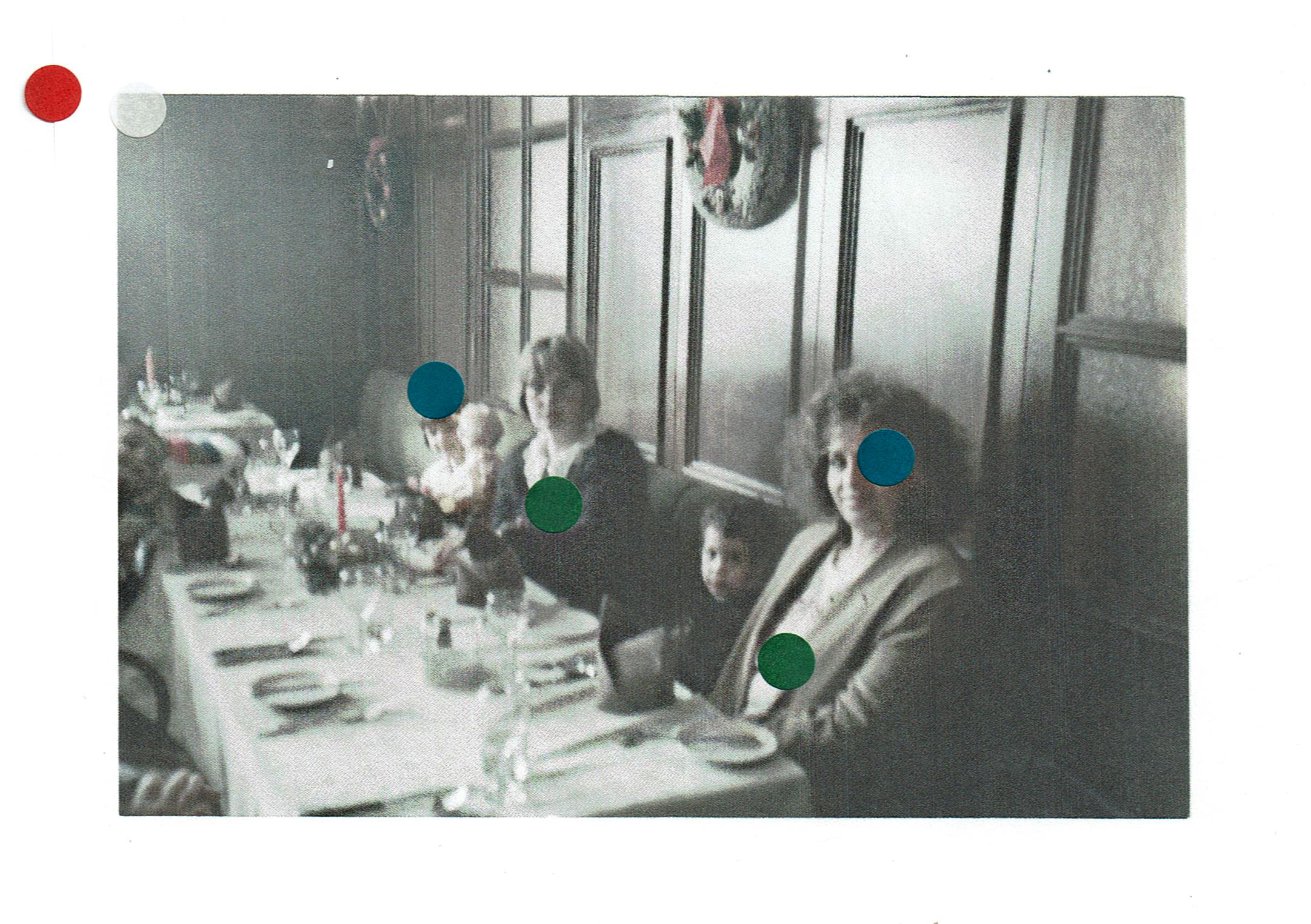 a photo of a family in a restaurant is decorated with blue and green dots.